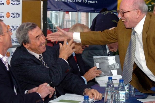 Nobby Stiles shares a joke with Gordon Banks at the National Football Museum in Deepdale, Preston
