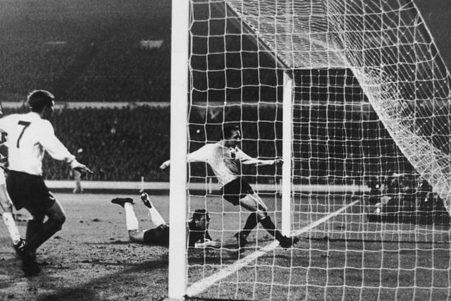Nobby Stiles, centre, scoring during an international friendly against West Germany at Wembley Stadium, 23rd February 1966. It was the only goal of the game and England won 1-0