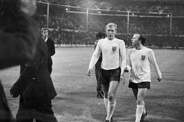 16th July 1966: Nobby Stiles and Bobby Moore chatting to each other during the England versus Mexico 1966 World Cup match