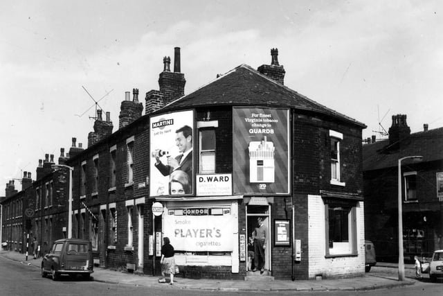 August 1964 and pictured are back-to-back terraced houses on Bower Road and New Pepper Road in Hunslet. On the corner at number 26 New Pepper Road is D. Ward, grocer and confectioner.