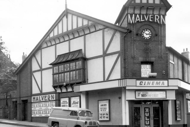 The front doors of the Malvern Cinema  at the junction of Beeston Road and Ashley Place, Beeston, in July 1964 advertising some of the latest films.