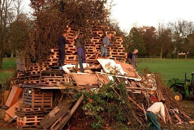 Workers gather donated wood to shape the Roundhay Park in November 1996.