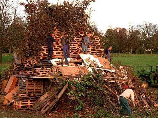 Workers gather donated wood to shape the Roundhay Park in November 1996.