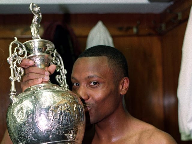 Rod Wallace pictured with the First Division trophy in the Elland Road dressing room after his goal proved the difference against Norwich City in the final game of the 1991/92 season.