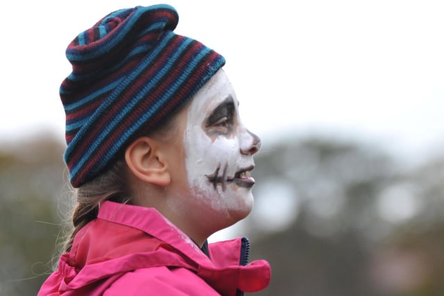 Children taking part in Marathon Kids, a fitness event with a Hallowe'en theme and a run around Astley Park, Chorley.