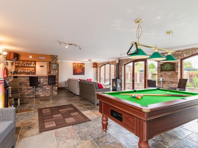 The perfect games room, complete with bar