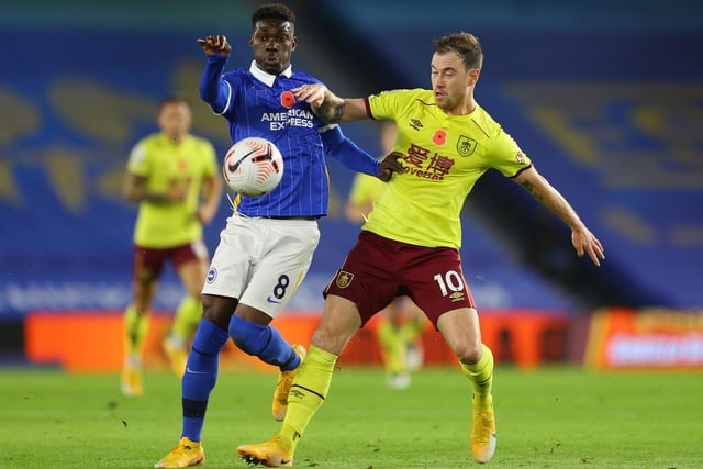 Yves Bissouma of Brighton and Hove Albion battles for possession with Ashley Barnes of Burnley during the Premier League match between Brighton & Hove Albion and Burnley at American Express Community Stadium on November 06, 2020 in Brighton, England.