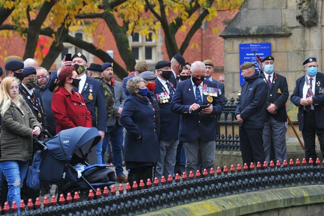 Veterans and members of the community pay their respects on Remembrance Sunday.