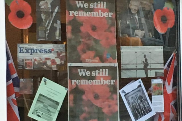 Jane Walton shared this snap of her window adorned with remembrance posters, and took part in the national two minute silence from her doorstep.