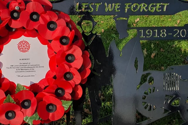 In Stanley Park John Barnett MBE Deputy Lieutenant of Lancashire, on behalf of The Lord Lieutenant of Lancashire, placed a wreath on the Bench of Remembrance, Veterans Walk