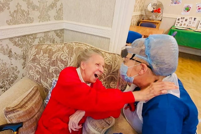 Marion Edwards, a resident at the Conifers, shares a moment with Suzanne Clague. The home pulled out all the stops to make sure residents didn't miss Remembrance Sunday