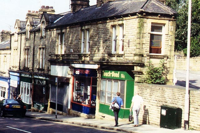 September 1999. Shops on Queen Street by Coffin Corner, the junction with Troy Road which is seen on the right. Shops include Touch-Wood.