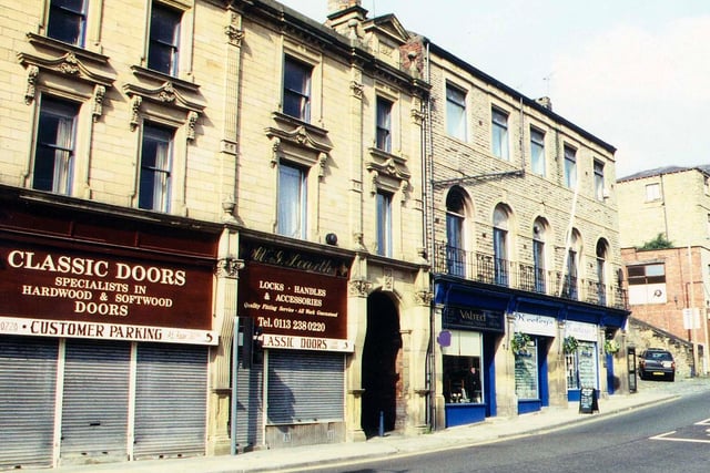 Shops on Cheapside and Chapel Hill in Morley Bottoms. They include Classic Doors, specialists in hardwood and softwood doors; after this the road becomes Chapel Hill featuring Valted Tailors and Keeley's Hairdressers.