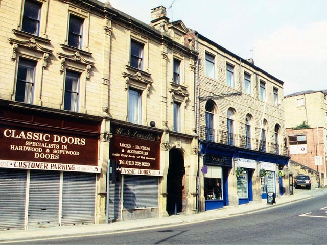 Shops on Cheapside and Chapel Hill in Morley Bottoms. They include Classic Doors, specialists in hardwood and softwood doors; after this the road becomes Chapel Hill featuring Valted Tailors and Keeley's Hairdressers.