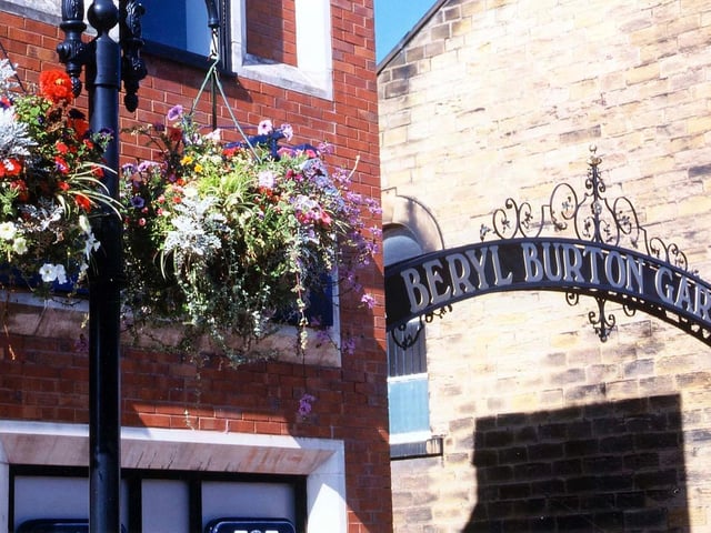 The Queen Street of the entrance to the Beryl Burton Gardens, laid out in 1990s to commemorate the cyclist who spent much of her life in Morley.