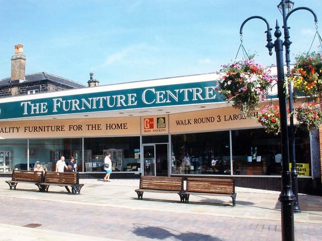 Tempest's DFS furniture store on Queen Street, which incorporates the front of Ashville House seen behind it.