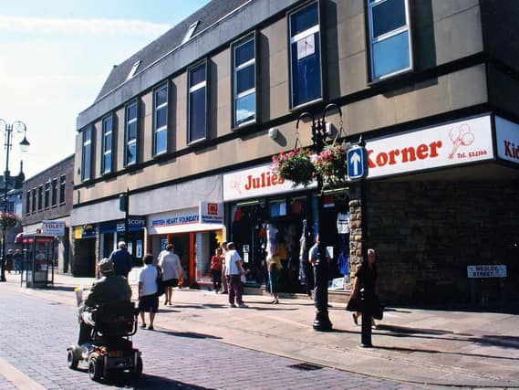 Looking south along Queen Street from its junction with Wesley Street at the building that Wesley Street Sunday School was pulled down for - a Tesco supermarket.