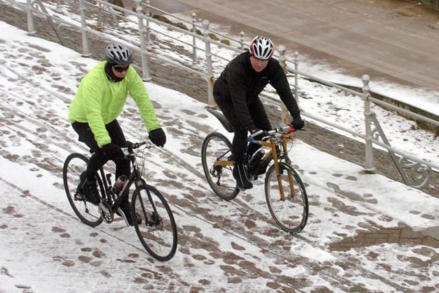 Cyclists braving the elements on the Promenade