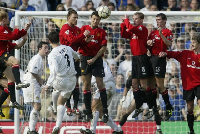 Ian Harte fires in a free kick against Manchester United at Elland Road in March 2002. The Red Devils won 4-3.