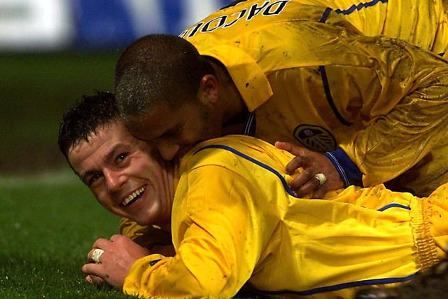 Ian Harte is congratulated by Oliver Dacourt after equalizing from a free kick during the UEFA Cup match against Grasshopper Club Zurich in November 2001.
