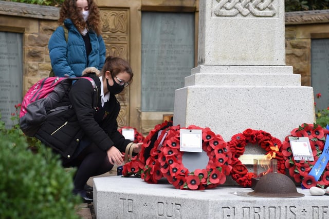 Wreaths were laid at the foot of the memorial