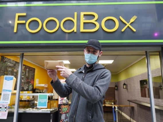 Kieron Gordon owner of The Food Box, offering takeaway food and pre-orders, Makinson Arcade, The Galleries shopping centre, Wigan.