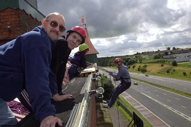 Mick Baines with his son Andrew Baines, 19, before Andrew's the Anthony Bone Marrow Trust abseil down Botany Bay in Chorley