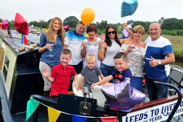 The Livesey family from Chorley celebrate aboard the Blue Moon at the Canal Fest held at Botany Bay to celebrate 200 years of the Leeds and Liverpool Canal.