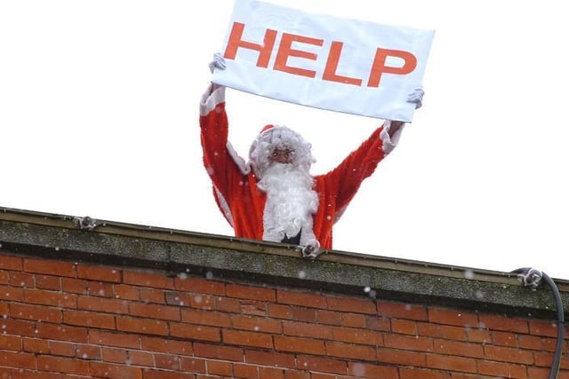 Santa had to be rescued from the roof of Botany bay in Chorley, by the Lancashire Fire Brigade, as part of the launch of their new Christmas Shop in 2007.