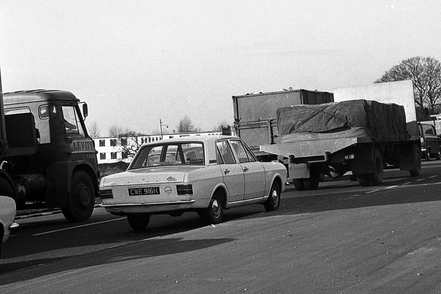 A rare traffic jam on the East Lancs Road in 1970 with some 60s classic cars in 1970