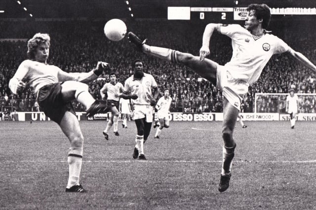 Arsenal's Willie Young and Leeds United's Derek Parlane in high kicking action during the clash at Elland Road in November 1980. The Gunners won 5-0.