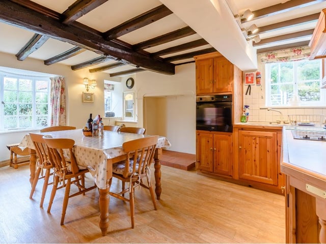 The beamed ceilings are an enchanting feature.