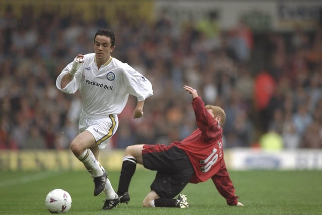 Gary Kelly gets away from Paul Scholes during the FA Carling Premiership match at Elland Road in March 1997.