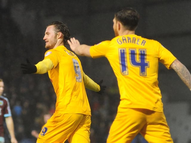 Will Keane celebrates with Joe Garner after giving PNE the lead against Burnley at Turf Moor in December 2015 - Keane's brother Michael was playing for the Clarets that day