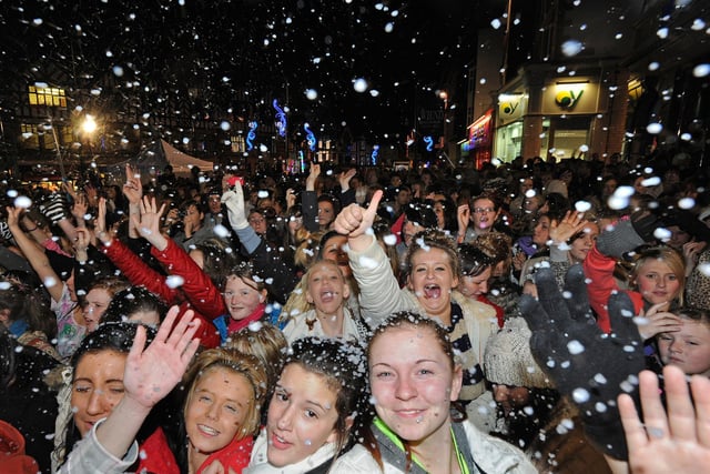 Fake snow showers on the crowd in 2011