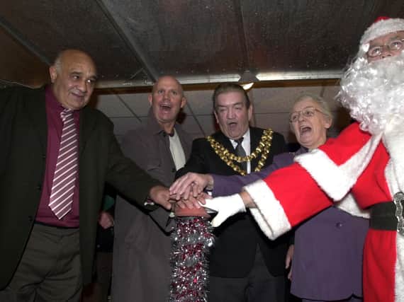 Switching on the Wigan Christmas lights are Wigan rugby legends Billy Boston and Mike Gregory, The Mayor and Mayoress Councillor Wilf and Mrs Agnes Brogan with Father Christmas in 2003.