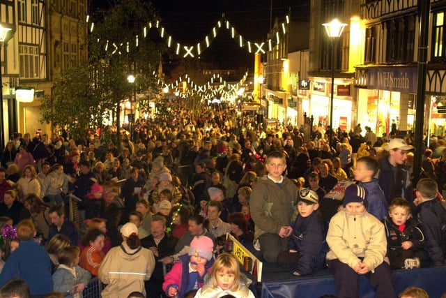 A large crowd gathers along Market Place and Standishgate for the Wigan Christmas lights switch on event in 2001.
