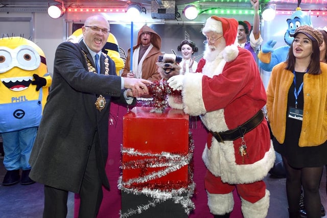 Just last year, 2019, the Mayor of Wigan Coun Steve Dawber switch on the Christmas lights with Hacker T Dog and Santa.
