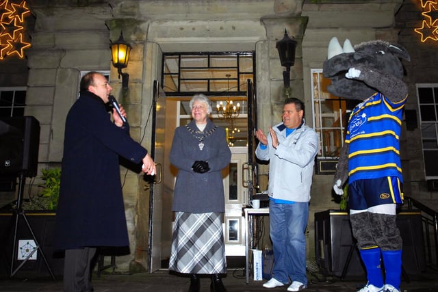 Christmas Lights organiser Chris Glew,  Mayor of Wetherby Coun Edna Hilditch, entertainer Dean Michael and Ronnie Rhino in 2009.