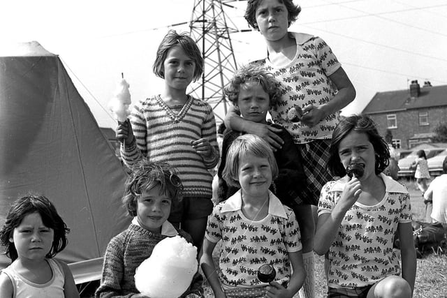 Kids enjoy a sweet treat at the summer fun day at Poolstock in 1976