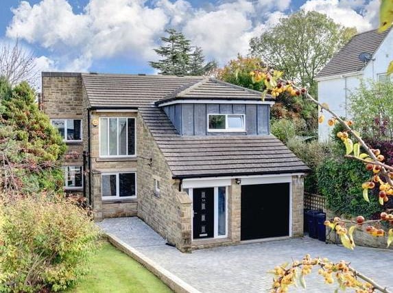 This modern stone built home is in the Tranmere Park area of Guiseley. It has five bedrooms, three bathrooms and a large study.