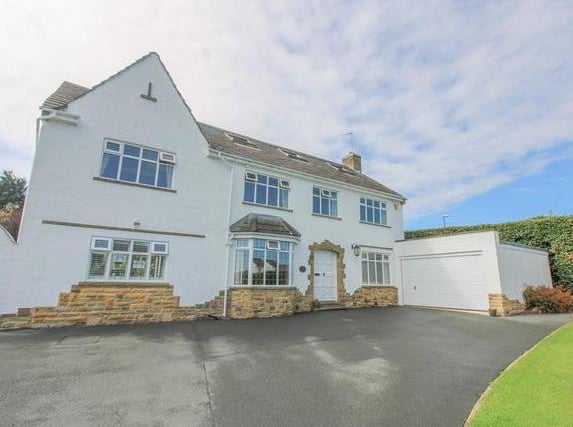 This large six bedroom home is in the Tranmere Park area of Guiseley. It has a large garden, open plan living area and a generous plot for car parking.