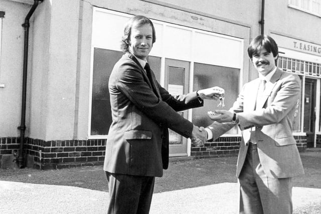 September 1982. Pictured is Councillor Michael Simmons (left) as he hands over the keys to the new Gipton Housing Office to the new housing manager Bob Prince.