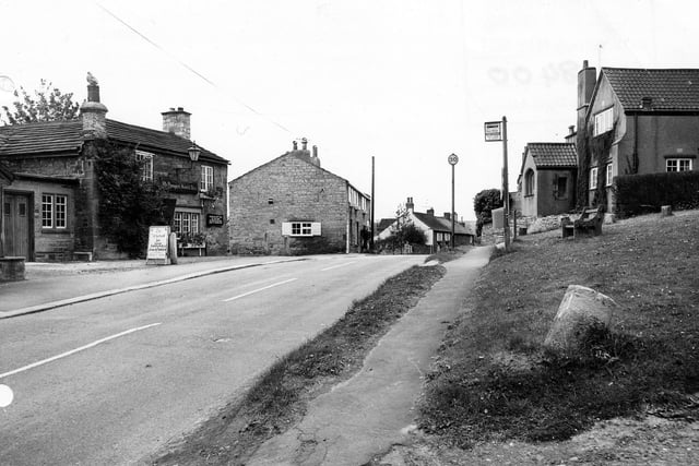 May 1982 and pictured is Linton Main Street looking south from the Junction with Trip Lane. On the left is the Windmill Inn.