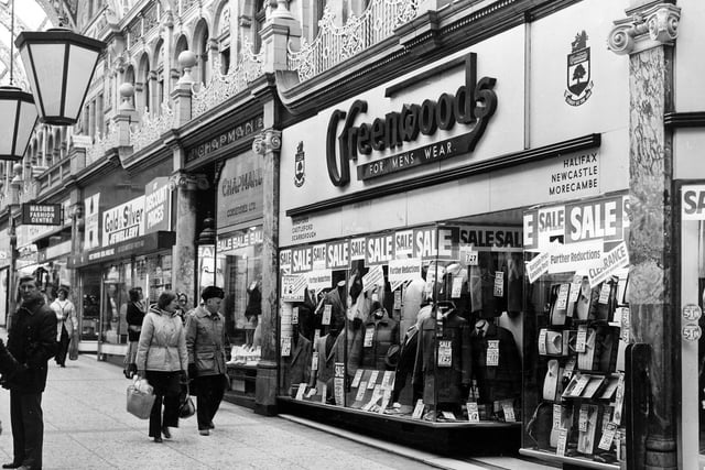 July 1982 and pictured is The County Arcade between Briggate and Vicar Lane. Shops seen include Highwood Investments Ltd. selling gold and silver jewellery at discount prices, Chapmans Corsetieres Ltd and Greenwoods.
