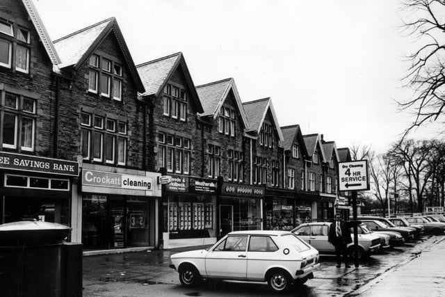 March 1982. A row of shops and businesses on Street Lane, Roundhay. These include Trustee Savings Bank, Crockatt Cleaning, Leeds and Holbeck Building Society and The Coffee Shop.