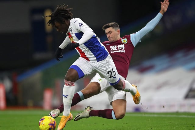 Burnley's English defender Matthew Lowton (R) vies with Crystal Palace's English midfielder Eberechi Eze (L) during the English Premier League football match between Burnley and Crystal Palace at Turf Moor in Burnley, north west England on November 23, 2020.