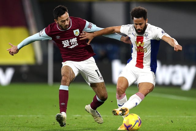 Andros Townsend of Crystal Palace is challenged by Dwight McNeil of Burnley during the Premier League match between Burnley and Crystal Palace at Turf Moor on November 23, 2020 in Burnley, England.