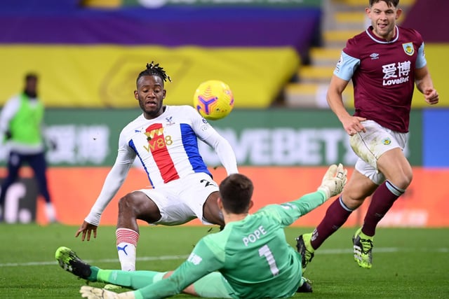 Nick Pope of Burnley saves from Michy Batshuayi of Crystal Palace during the Premier League match between Burnley and Crystal Palace at Turf Moor on November 23, 2020 in Burnley, England.