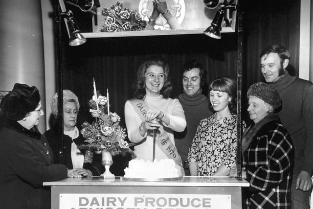 Women's Circle meeting at the Hotel Metropole in December 1970. Pictured are  Gertrude Hart, Alice Atkin, Julie Greenleaf, the National Dairy Queen, 1970, cutting the Women's Circle Christmas cake. Also Edward Elfes, Rosemary Sloan of the Milk Marketing Board, Laura Crowther and Eric Nunns.